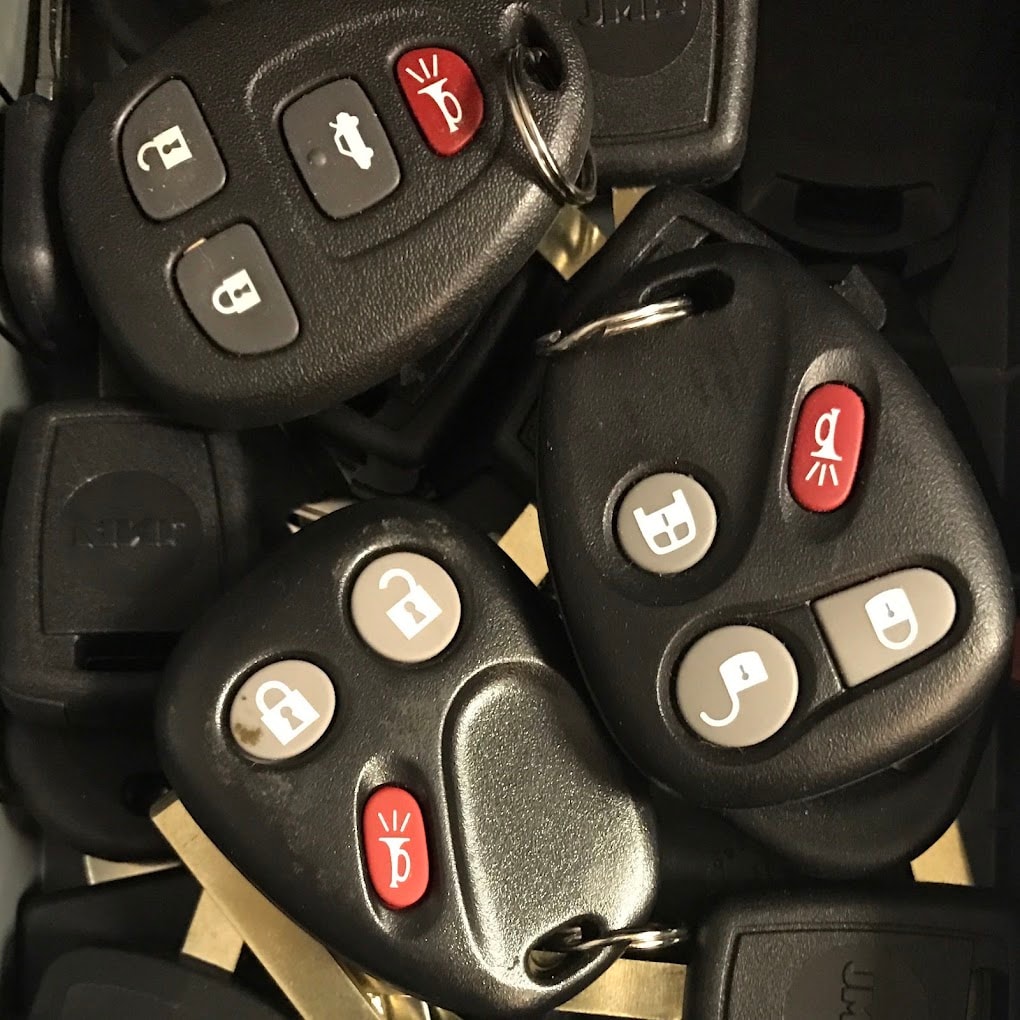 Collection of programmed automotive key fobs and remotes